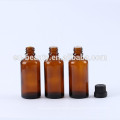 Glass bottles with orifice reducer